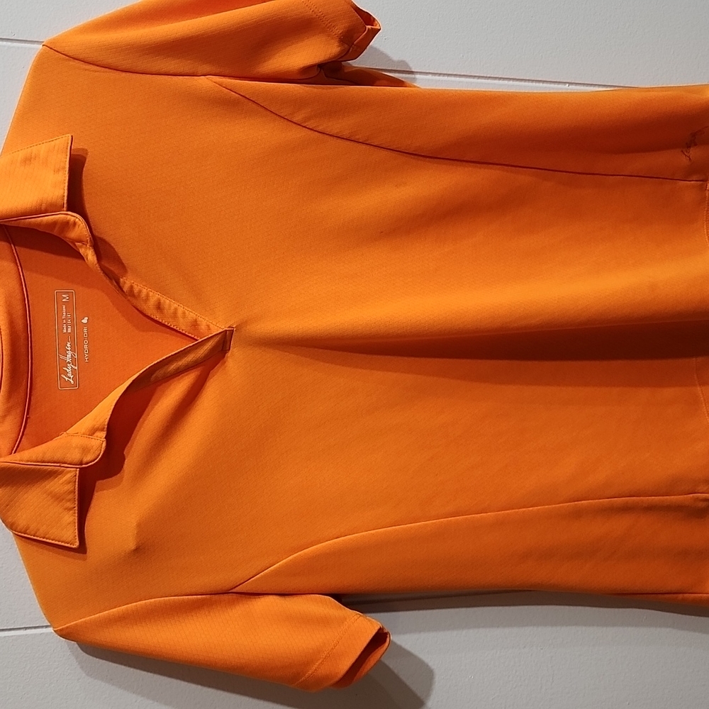 Lady Hagen. Med. Golf top.